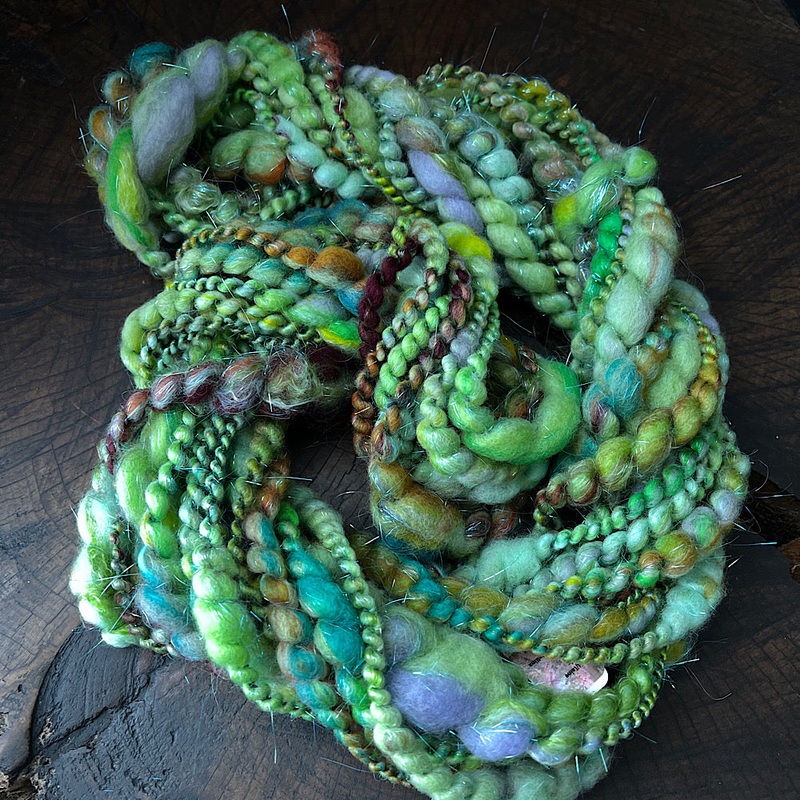 Fluffy spiral in mint green|45 grams or 1.5 oz|50 grams or 1.7 oz