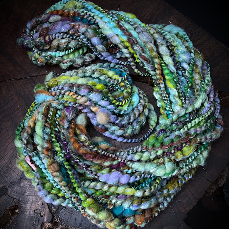 Fluffy spiral in mint green|60 grams or 2.1 oz|55 grams or 1.9 oz|75 grams or 2.6 oz